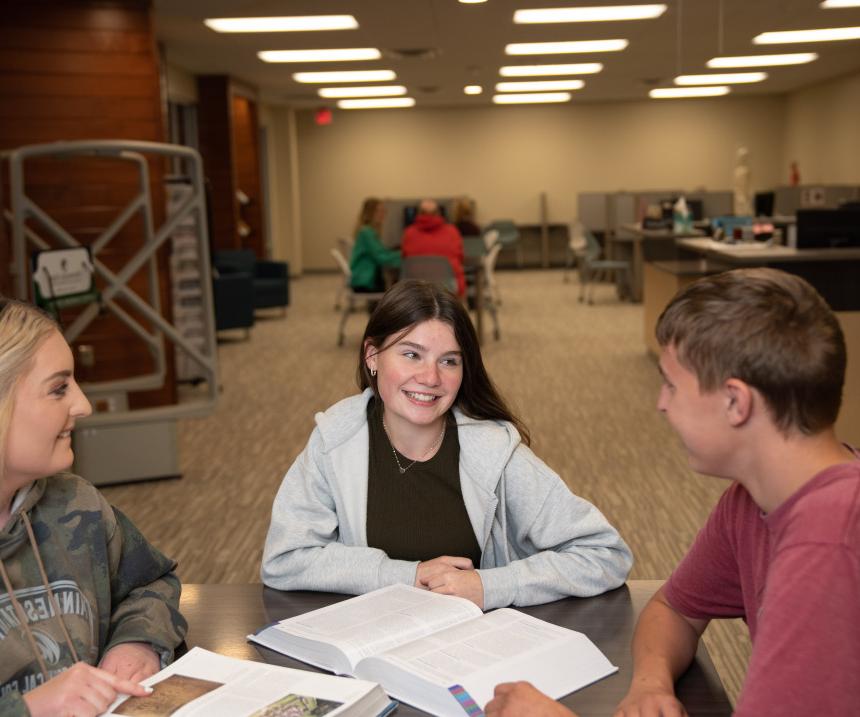 Students studying at a table at M State in Wadena